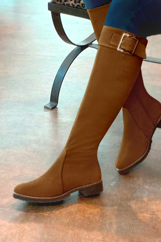 French elegance and refinement for these caramel brown riding knee-high boots, 
                available in many subtle leather and colour combinations. Record your foot and leg measurements.
We will adjust this pretty boot with zip to your measurements in height and width.
Its large, comfortable gum sole will isolate you from the ground.
You can customise the boot with your own materials, colours and heels on the "My Favourites" page.
To style your boots, accessories are available from the boots page. 
                Made to measure. Especially suited to thin or thick calves.
                Matching clutches for parties, ceremonies and weddings.   
                You can customize these knee-high boots to perfectly match your tastes or needs, and have a unique model.  
                Choice of leathers, colours, knots and heels. 
                Wide range of materials and shades carefully chosen.  
                Rich collection of flat, low, mid and high heels.  
                Small and large shoe sizes - Florence KOOIJMAN